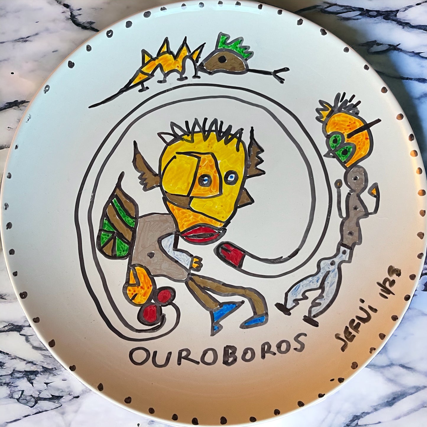 Ouroboros sur assiette